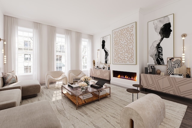 living area with a warm lit fireplace, crown molding, and wood finished floors