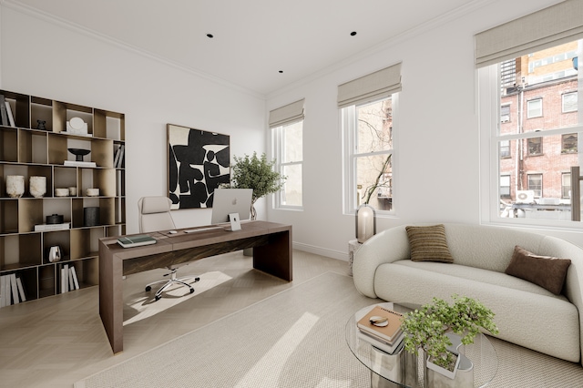 office space featuring baseboards and ornamental molding