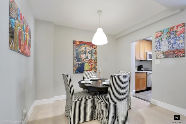 dining area featuring light hardwood / wood-style floors