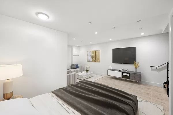 bedroom with light wood-type flooring