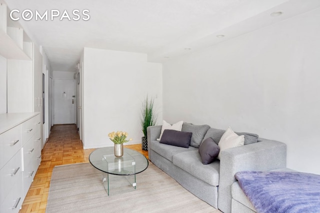 living room featuring light parquet floors