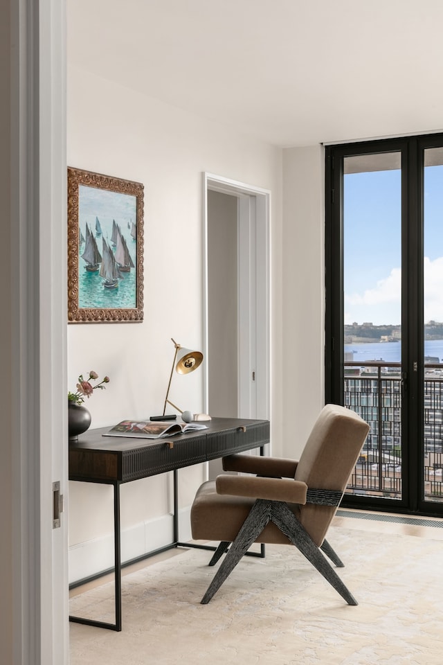 100 Vandam St Unit 20-A, New York City, NY 10013 - home office with a wall of windows, a water view, and wood finished floors