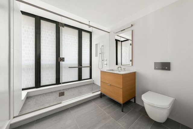 100 Vandam St Unit 20-A, New York City, NY 10013 - bathroom featuring toilet, vanity, and tile patterned floors