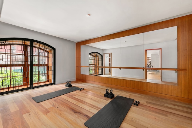 100 Vandam St Unit 20-A, New York City, NY 10013 - exercise room featuring wood finished floors and baseboards