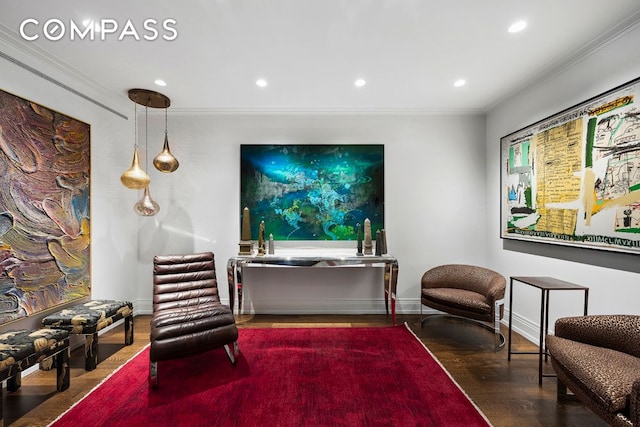 living area with ornamental molding, dark wood-type flooring, and recessed lighting