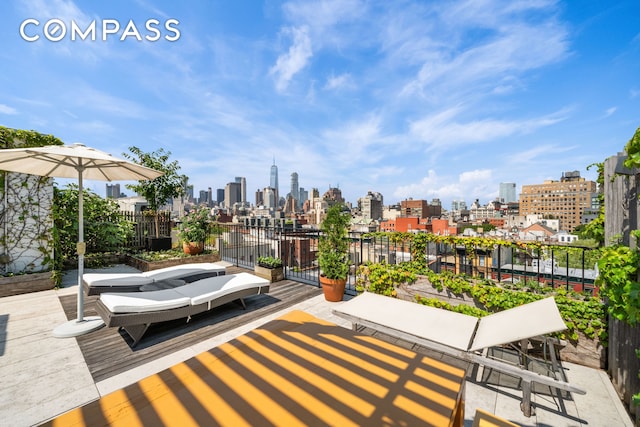 view of patio / terrace with a view of city