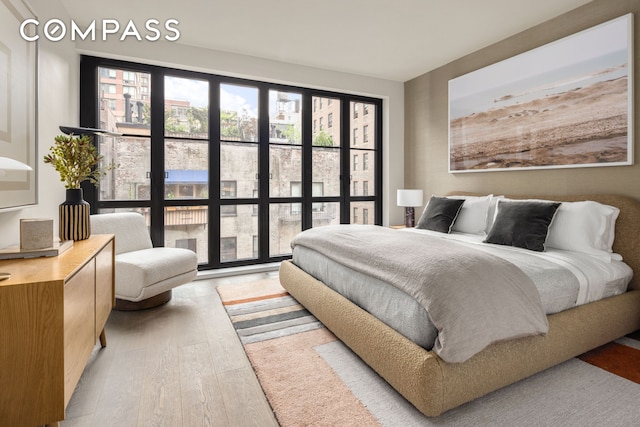 bedroom featuring wood finished floors