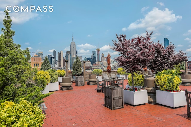 view of patio / terrace with a city view