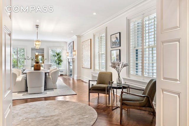 interior space featuring recessed lighting, crown molding, and baseboards