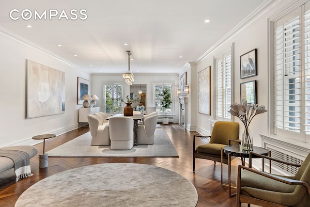 dining space with ornamental molding, recessed lighting, and baseboards