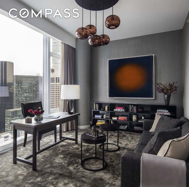 living room featuring an inviting chandelier