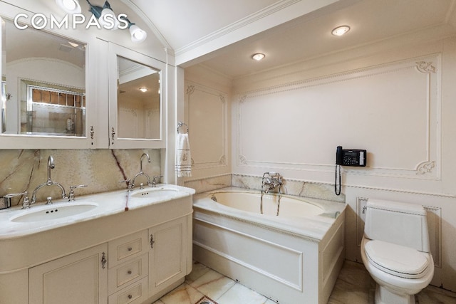 bathroom featuring toilet, a sink, ornamental molding, a bath, and decorative backsplash