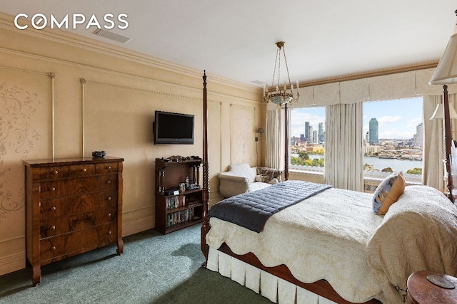 carpeted bedroom with ornamental molding and visible vents