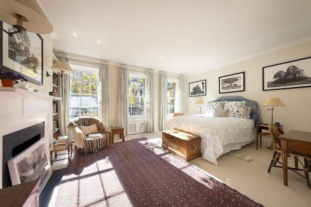 carpeted bedroom with crown molding