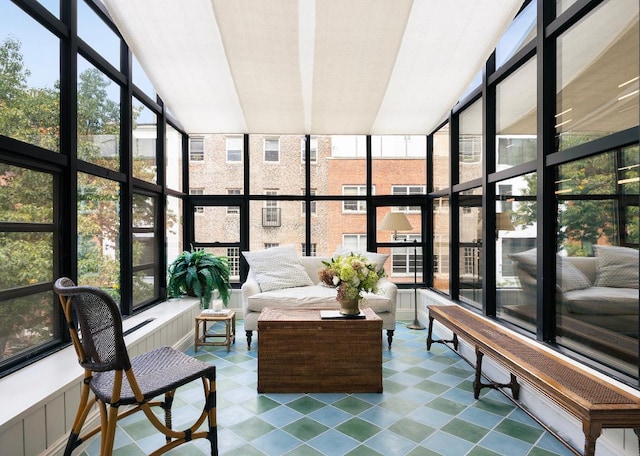 sunroom / solarium featuring a wealth of natural light