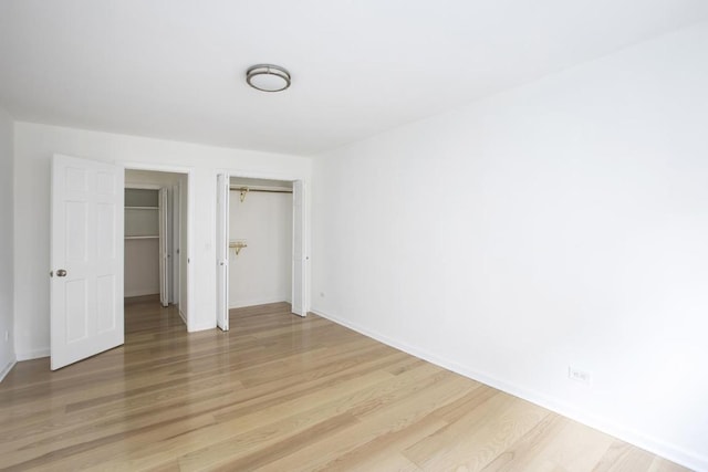 unfurnished bedroom featuring light hardwood / wood-style flooring