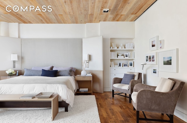 bedroom with wood ceiling and wood finished floors