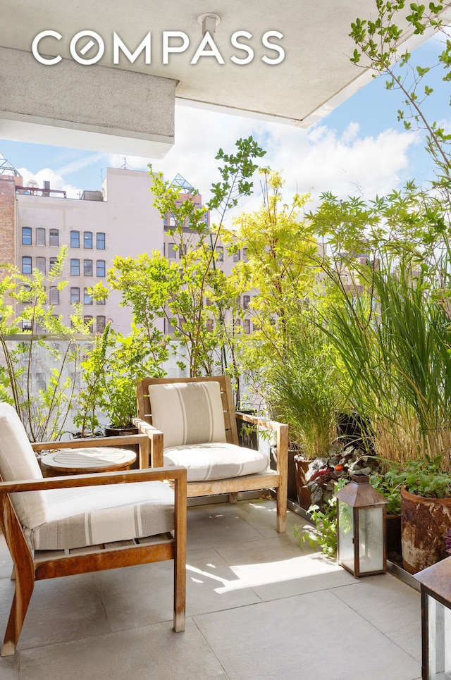 balcony featuring a patio area and an outdoor living space