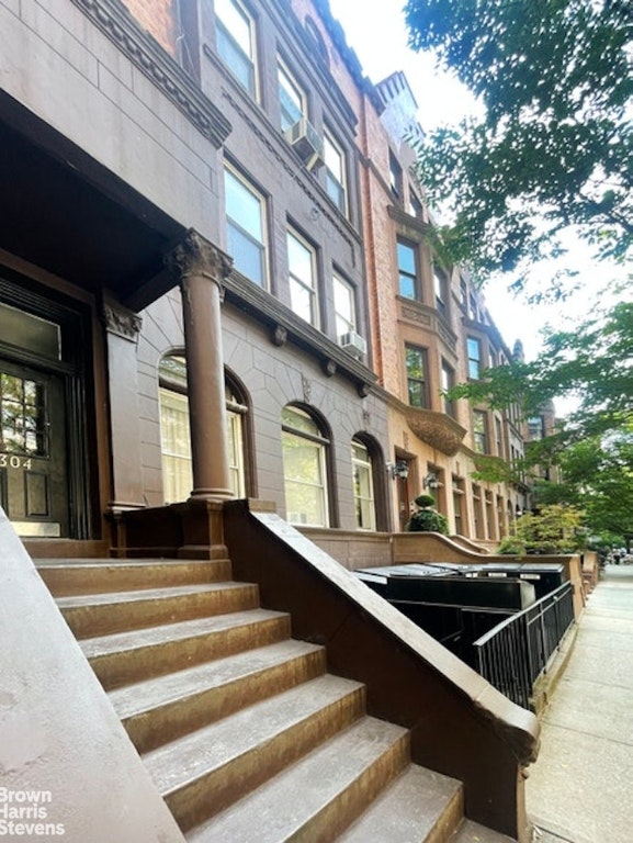 exterior space featuring a residential view and entry steps