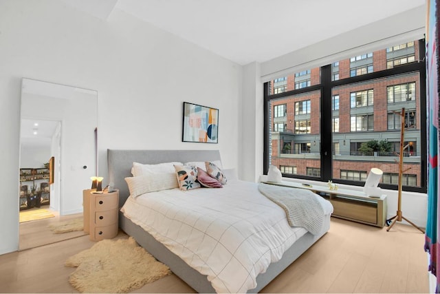 bedroom with light hardwood / wood-style flooring