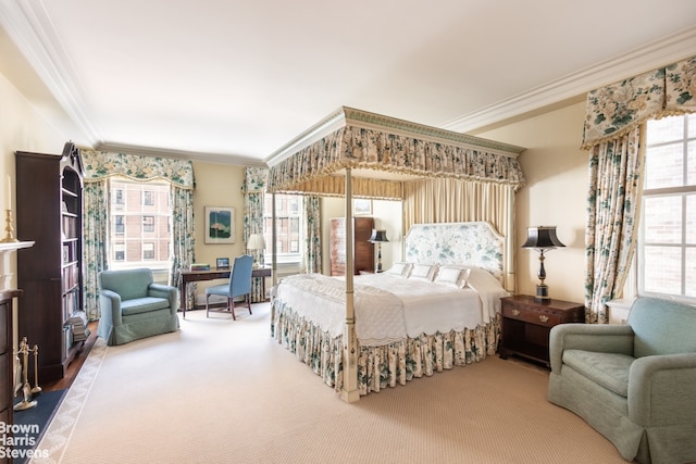 bedroom featuring crown molding and carpet