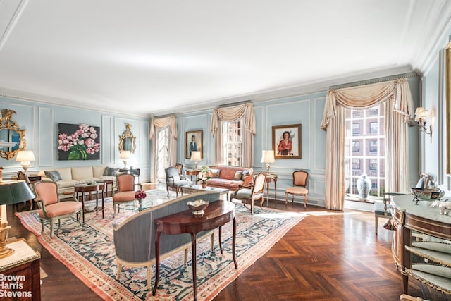 living room featuring parquet flooring and crown molding