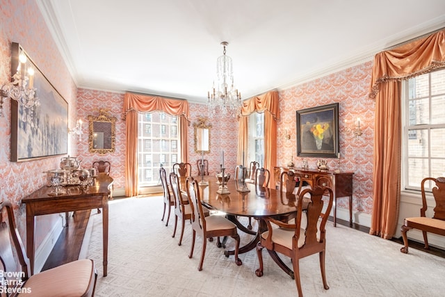 dining space with light colored carpet, ornamental molding, and a chandelier