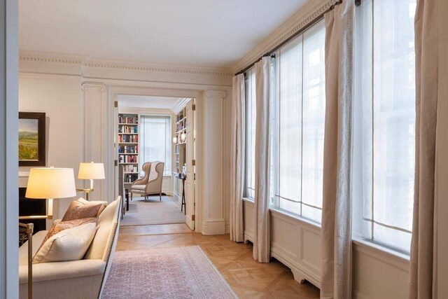 living area featuring light parquet flooring