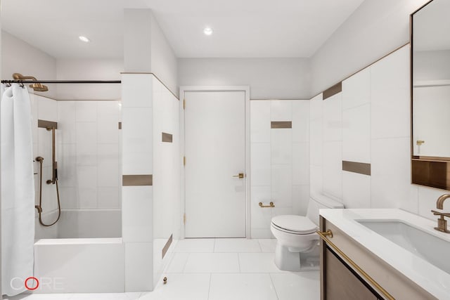 full bathroom featuring vanity, shower / bath combo, tile patterned flooring, tile walls, and toilet