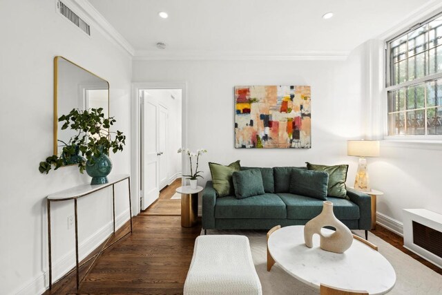 interior space with light tile patterned floors, a notable chandelier, and crown molding