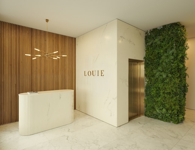 welcome area featuring a chandelier