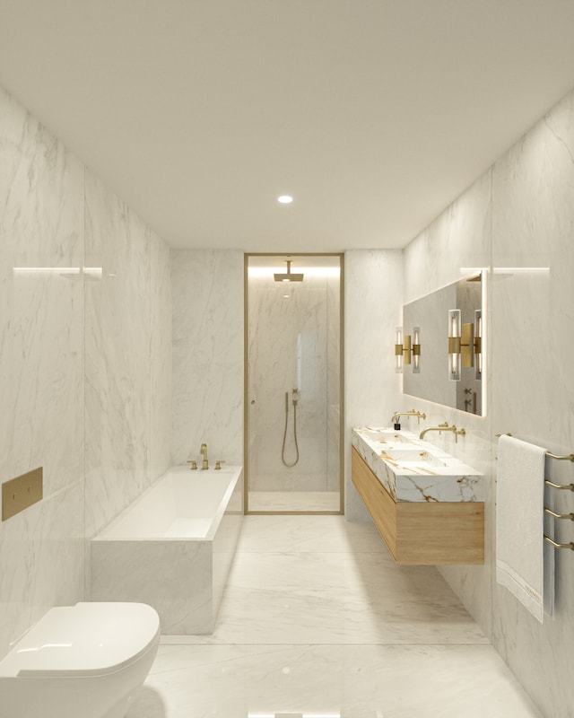 16 W 18th St Unit 5, New York City, NY 10011 - bathroom with a bath, double vanity, tile walls, a marble finish shower, and toilet