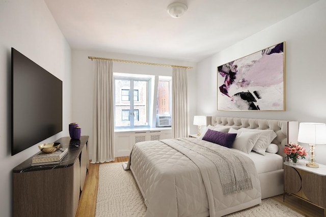 bedroom featuring light wood-type flooring