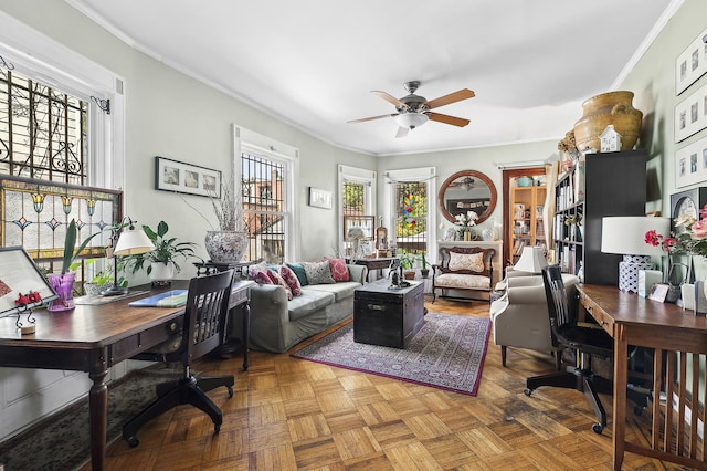 office area with a ceiling fan and ornamental molding