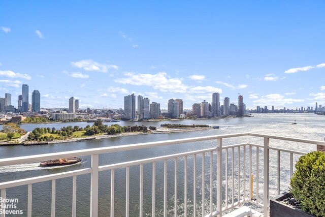 60 Sutton Pl S Unit Ph19S, New York City, NY 10022 - balcony with a view of skyline and a water view