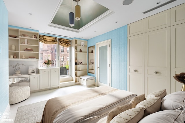 60 Sutton Pl S Unit Ph19S, New York City, NY 10022 - bedroom featuring a tray ceiling, a closet, wallpapered walls, and ornamental molding