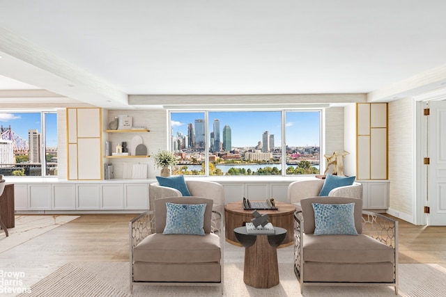 60 Sutton Pl S Unit Ph19S, New York City, NY 10022 - sitting room with a view of skyline and light wood finished floors