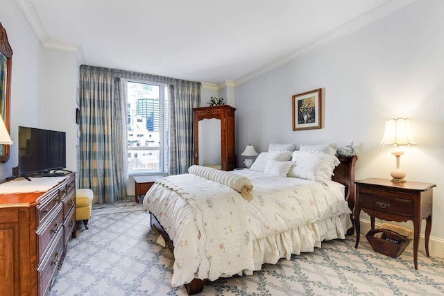 bedroom with light colored carpet, crown molding, and baseboards