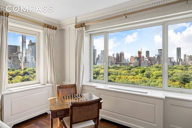 sunroom / solarium with a city view