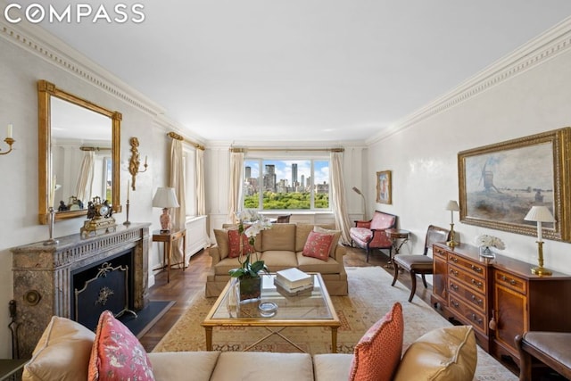 living room featuring ornamental molding and parquet flooring