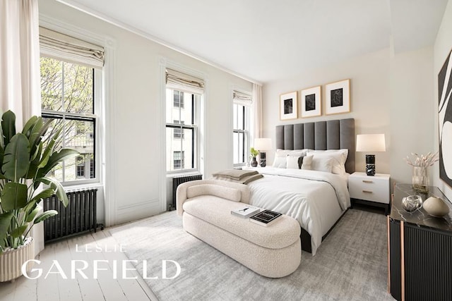 bedroom featuring radiator heating unit