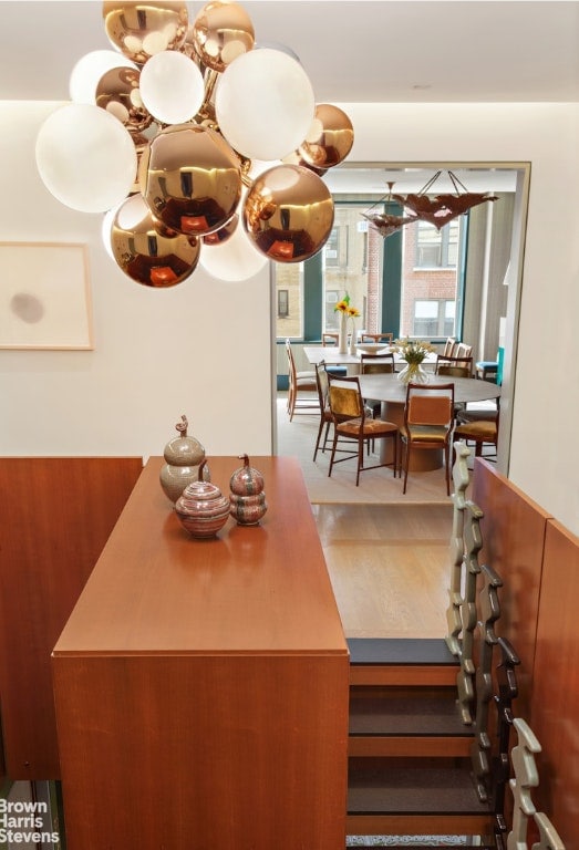 dining area with a notable chandelier