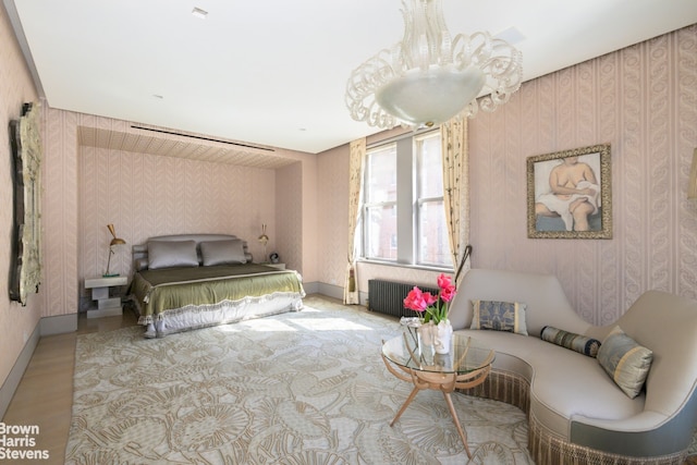 bedroom featuring radiator, wallpapered walls, and baseboards