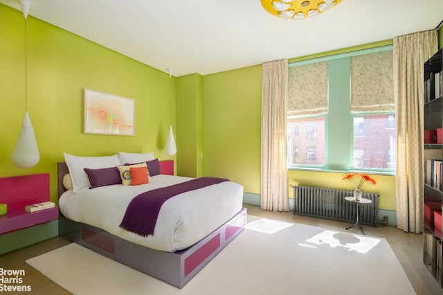 bedroom with radiator heating unit