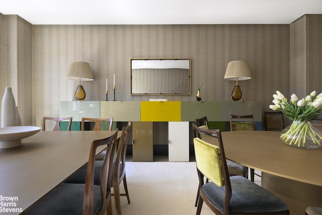 dining area with wallpapered walls