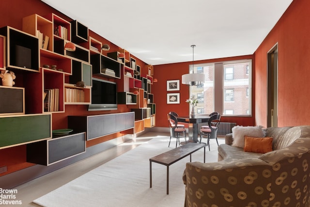 living area featuring radiator