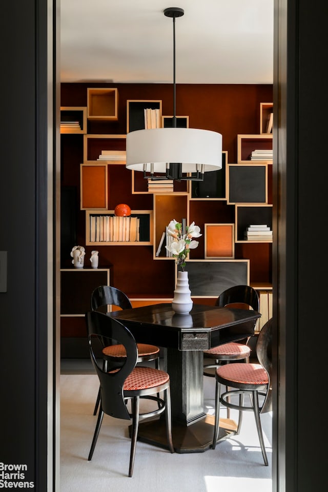 dining space featuring carpet floors