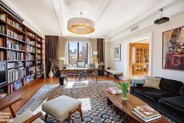 office area with hardwood / wood-style floors