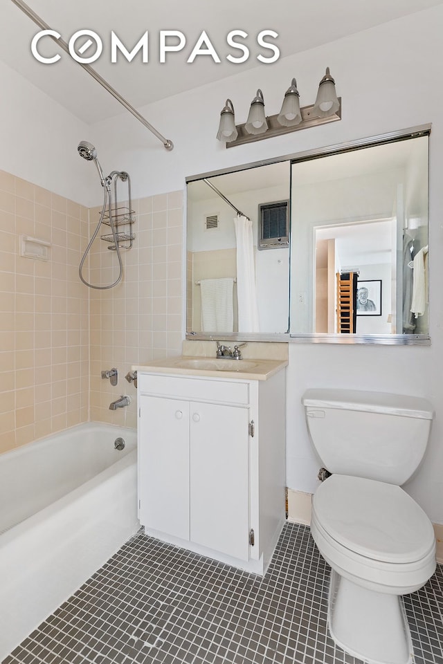 bathroom with visible vents, toilet, shower / bath combo, tile patterned floors, and vanity