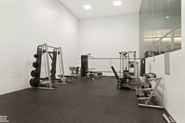 interior space featuring track lighting and light hardwood / wood-style floors